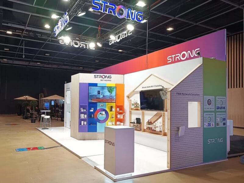 Well-organized display area for STRONG's products within a modular exhibition booth in Paris