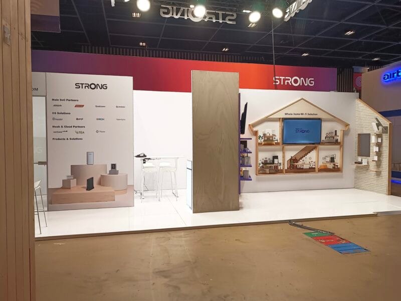 Modern illuminated modular exhibition stand for STRONG at a European trade show