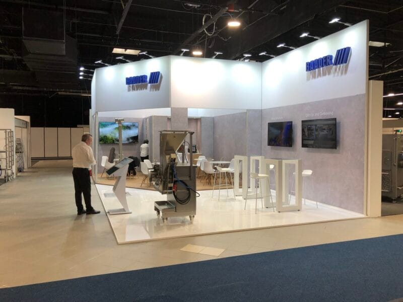 Interior of Baader’s trade show booth – modern furniture and functional equipment.