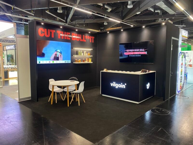 Custom-built exhibition stand for Vilgain at BIOFACH trade fair in Germany. Stand 360 – exhibition stand builder.