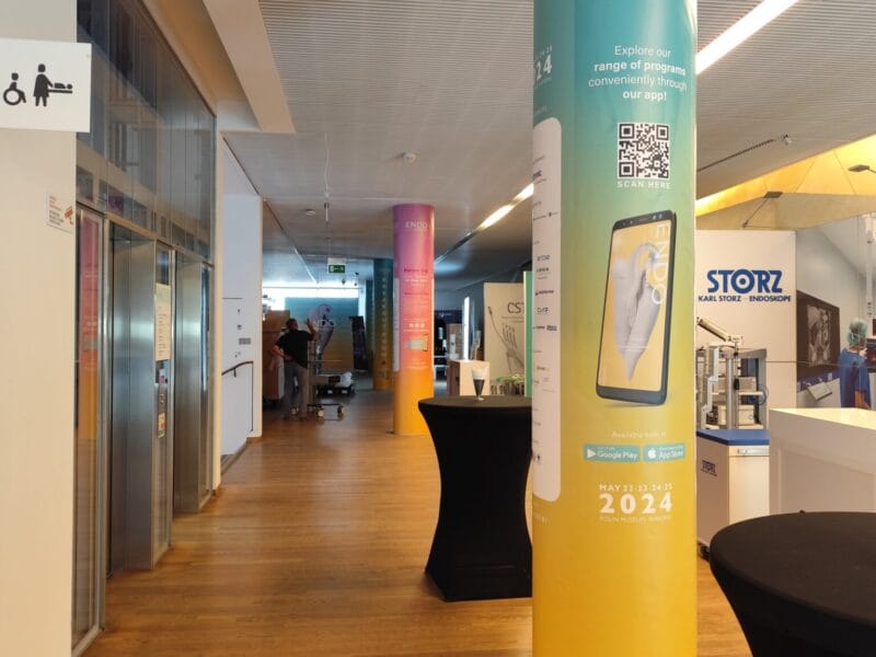 Printed branding wrapped around an event column
