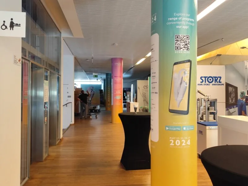 Printed branding wrapped around an event column