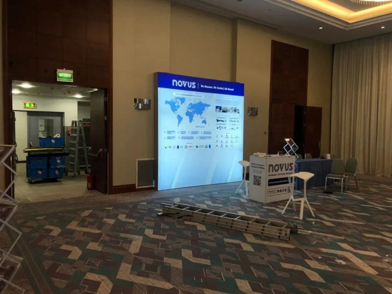 Exhibition booth at a hotel venue with modular setup