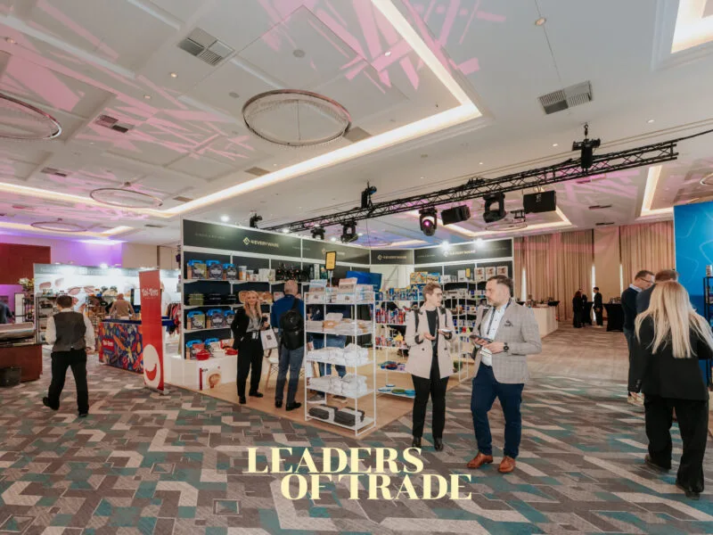 Hotel event booth with corner graphic layout and mobile product displays