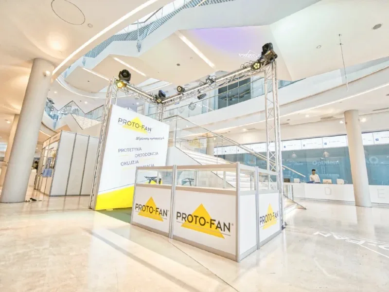Octanorm booth with counter and branded panels