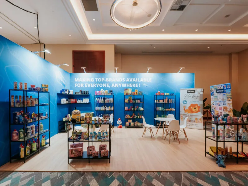 elegant product display booth with branded backdrop